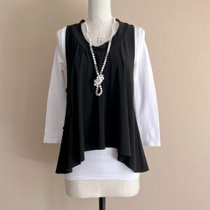 Black Popper Top with Front Ruching and Split Back Adds Style and Versatility